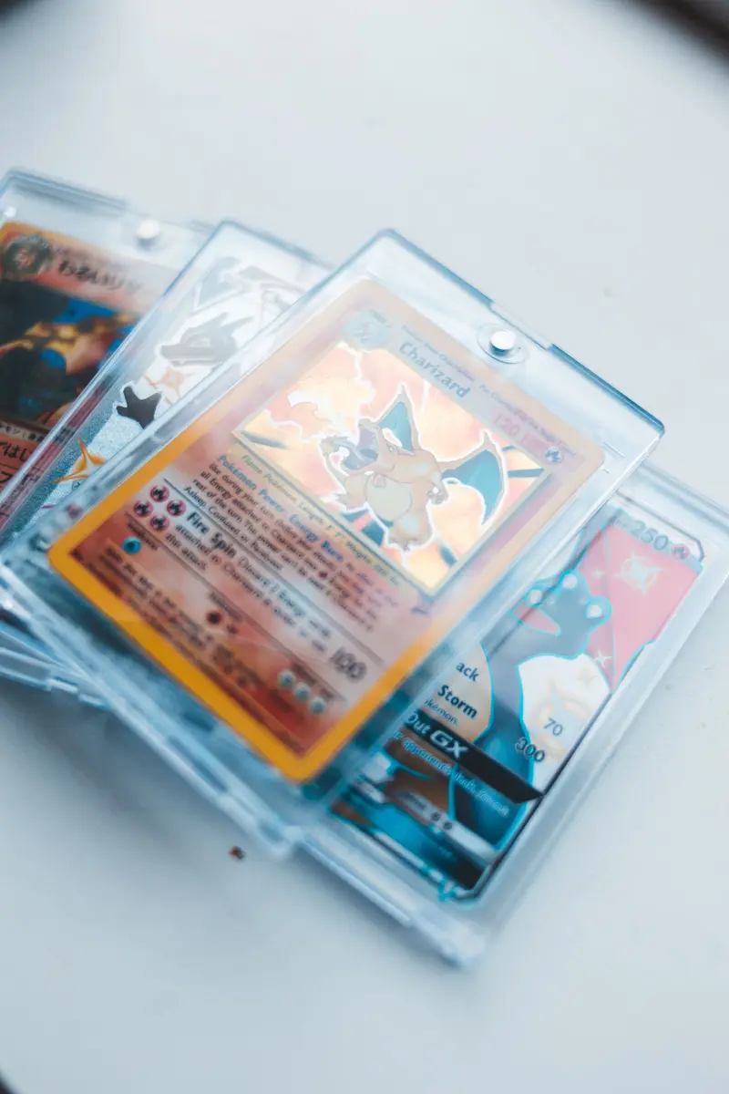 A stack of vintage trading cards in clear protective holders